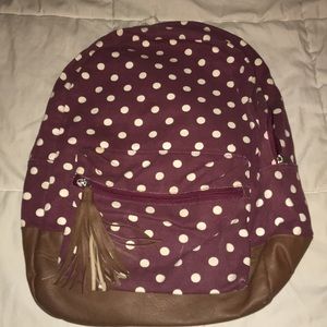 Maroon polka dotted backpack